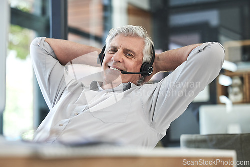 Image of Call center, customer support and senior man relax in office for help, sales and telemarketing. Communication, manager and elderly male worker stretch on break for contact, crm service and consulting