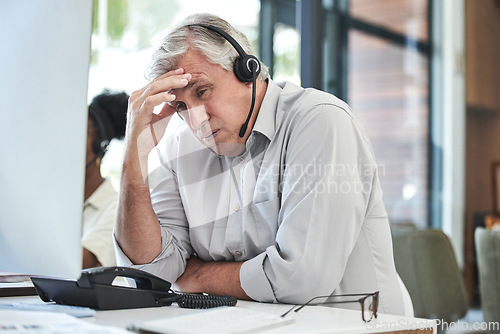 Image of Stress, telemarketing manager and man with headache in customer service agency with pain or crisis. Communication fail, senior management with computer or help desk consultant with problem phone call