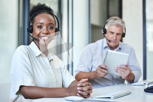 Image of Black woman, portrait and call center work of a employee with telemarketing and contact us job. Phone consultation, African female person and web support in office with staff working on online desk