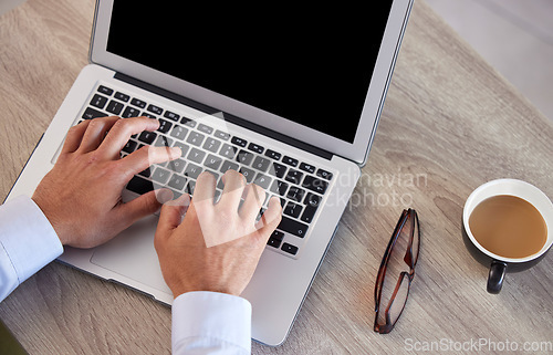 Image of Hands, keyboard and person typing on a laptop in the morning with coffee on a desk writing a proposal or business plan. Website, web and entrepreneur working or search the internet writing a blog