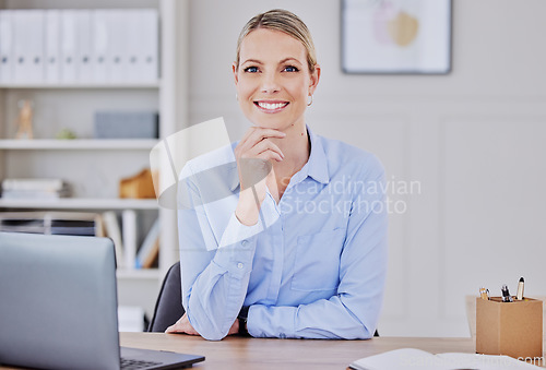 Image of Young caucasian business woman, portrait and smile at desk with motivation, entrepreneurship and finance agency. Accounting expert, modern office and happy for career vision at financial startup