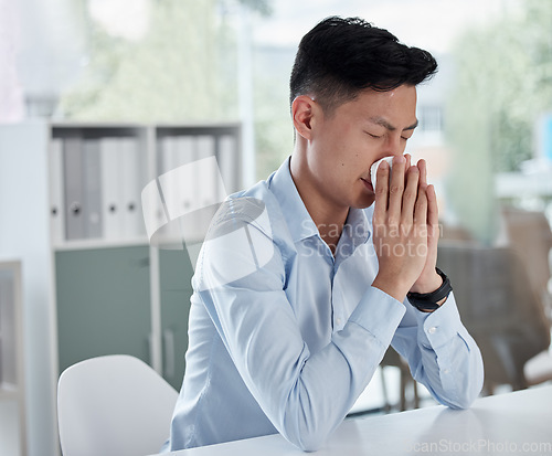 Image of Allergy, blowing nose and virus with asian man in office for illness, influenza and sick. Sneeze, bacteria and disease with male employee and tissue in corporate business for allergies and congestion