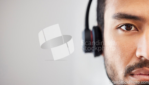 Image of Portrait of man, mockup or virtual assistant in call center tech support consulting in telemarketing in headset. Mock up space, face or serious consultant in telecom sales with headphones in studio