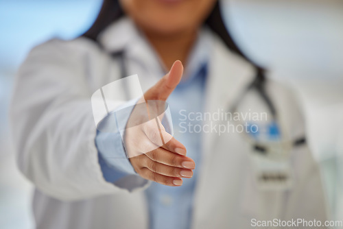 Image of Closeup, handshake and doctor with hands of woman for meeting, welcome or thank you. Consulting, medicine and medical with female healthcare worker in hospital for choice, partnership or introduction