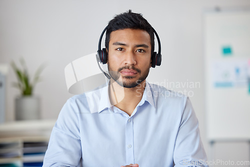 Image of Serious portrait of man in call center, headset and help at customer service agency or sales desk. Telemarketing, communication and virtual assistant, businessman with focus, support and headphones.