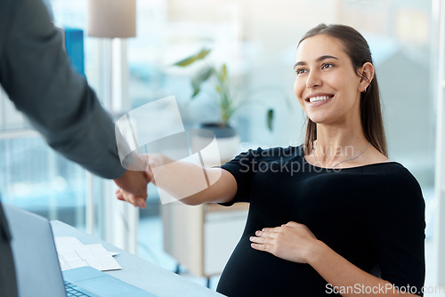 Image of Pregnant business woman, hand shake and office with man, welcome or hiring in finance company. Female HR manager, shaking hands and interview for recruitment with smile, respect and touching stomach