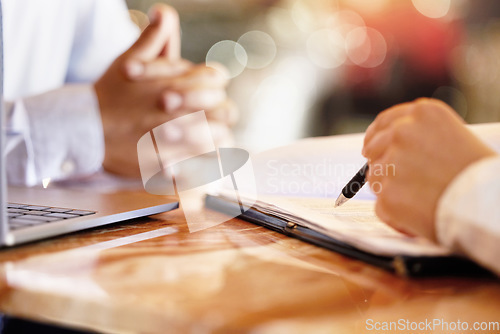 Image of Hands, notebook and writing with a human resources interview for a job opportunity or vacancy. Flare, hiring and recruitment with an hr manager meeting a candidate for business growth or development