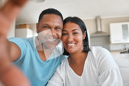 Image of Young couple, home and selfie with smile, happiness and love with post, social media app and portrait together. Man, woman and happy with photography, profile picture and internet blog in house