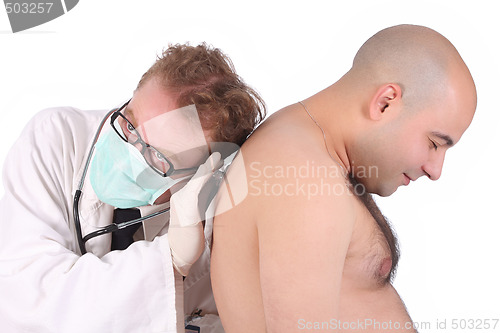 Image of funny doctor checking a patient 