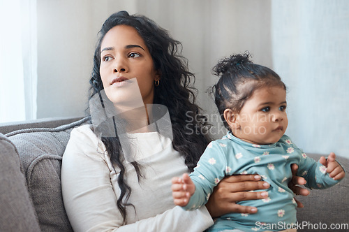 Image of Mental health, mother with her baby and on sofa waiting for a doctor with a lens flare. Depression or disconnect, postpartum, anxiety or counseling and woman with her child wait on a therapist