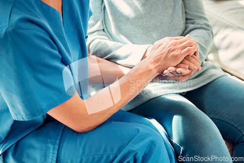 Image of Holding hands, support and nurse with senior patient for care and trust in a nursing home for people in retirement. Caregiver, help and elderly woman or person with medical and cancer advice