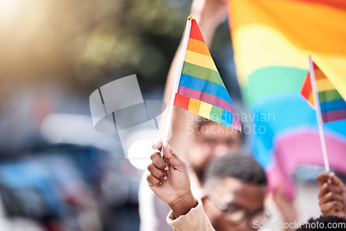 Image of Closeup, hands and LGBTQ flag with people, protest and community with human right, gay and lesbian. Zoom, queer and group with rainbow symbol, sexuality and bisexual with freedom, pride and happiness