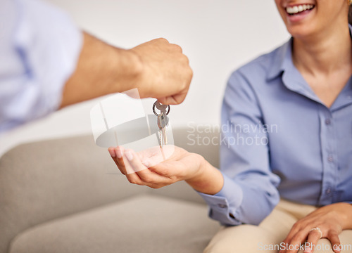 Image of Real estate, hands and giving keys to woman after moving into new home. Property agent, realtor and handing over key to happy person for sale, loan or mortgage investment in apartment, house or rent.