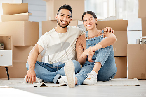 Image of Happy, moving and box with portrait of couple in living room of new home for investment, property or support. Real estate, packing and goal with man and woman in apartment for rent, homeowner or love