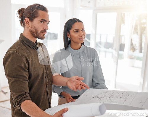 Image of Teamwork, architecture and couple with blueprint for planning at construction site. Document, architects collaboration and man and woman with design for engineering, building plan or project strategy