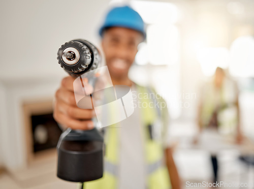 Image of Engineer, handyman and drill in hand of a man for maintenance or carpenter work. Male construction worker, constructor or contractor with electric power tools at building site for renovation mockup