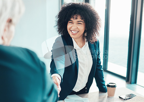 Image of Business people, staff and handshake in meeting, collaboration and agreement with negotiation. Woman, employee or coworkers shaking hands, cooperation or teamwork with partnership, smile and contract