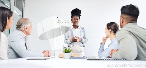 Image of Presentation, black woman speaker and team in business meeting, market research and economy strategy workshop. People at training seminar, leadership and brainstorming collaboration at finance firm