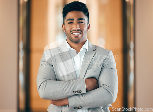 Image of Portrait, accountant and business man with arms crossed in company office. Confidence, face and happy professional, entrepreneur or auditor from India with pride for career, job and success mindset.