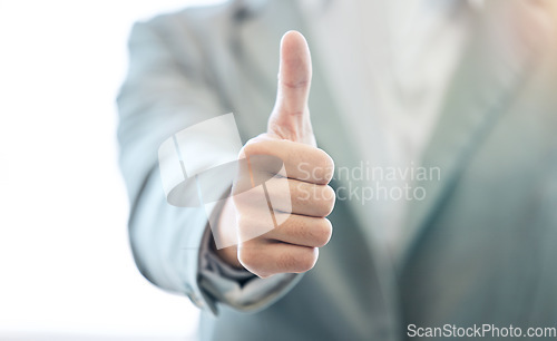 Image of Businessman, hand and thumbs up for approval, success or corporate winning at the office. Hands of man with thumb emoji, yes sign or like for achievement, agreement or thank you at the workplace