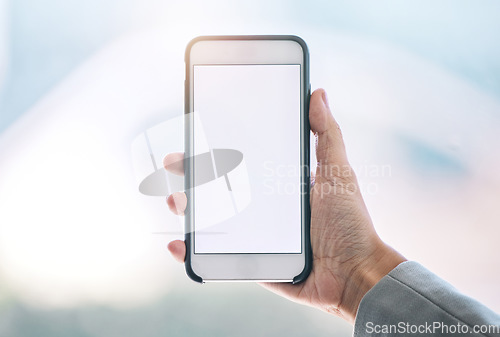 Image of Person, phone and hands with mockup screen for advertising, marketing or social media at office. Hand holding mobile smartphone or app with mock up or copy space display for advertisement or branding