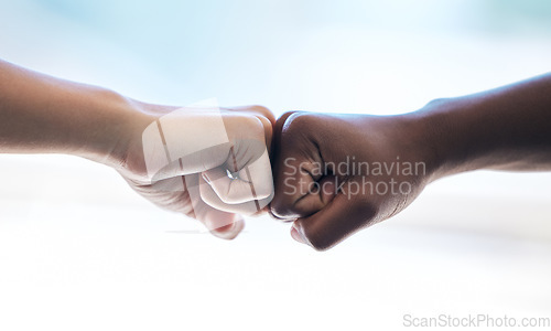 Image of Fist bump, partnership and thank you with business people in agreement over a deal during a b2b meeting. Trust, support and collaboration with diverse colleagues greeting to say welcome while meeting