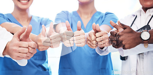 Image of Thumbs up, success and doctors for teamwork, healthcare support and excellence in hospital services. Nurses, medical diversity and group of people people like, yes and thank you or ok hands or emoji