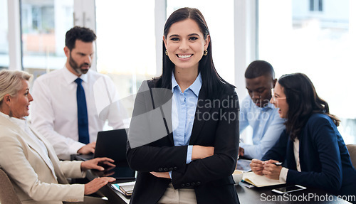 Image of Portrait, staff and woman with arms crossed, business and leadership with confidence, career or professional. Face, female person or executive teamwork with group, professional or planning with smile