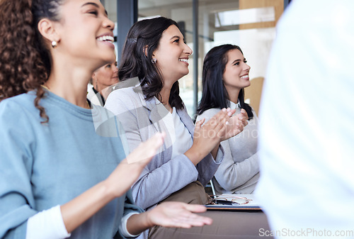 Image of Business people, applause and audience at a conference, seminar or corporate workshop. Professional women group clapping hands in crowd for convention, training and presentation or trade show success