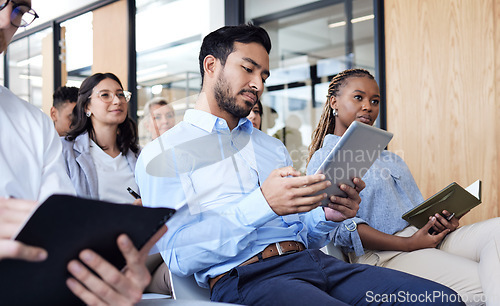 Image of Staff, group and business people in a conference room, audience and seminar for corporate training, listening and diversity. Team, man and woman with notebook, tablet and workshop for development