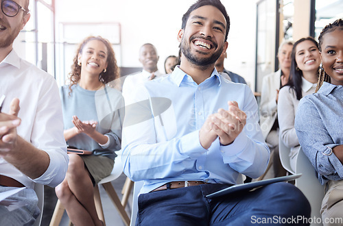 Image of Business people, laughing and audience applause at a conference, seminar or corporate workshop. Professional men and women group together in crowd for convention, training and presentation success