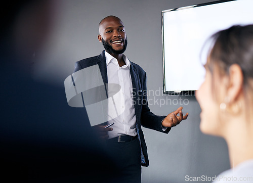 Image of Meeting, presentation and training with a business black man in the boardroom for a coaching seminar. Management, education and planning with a young male speaker in he office during a workshop