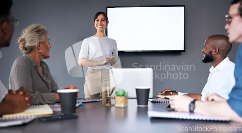 Image of Business woman, meeting and presentation with mockup screen for team strategy or project management at office. Female person, coach or mentor with smile in staff training on mock up at the workplace