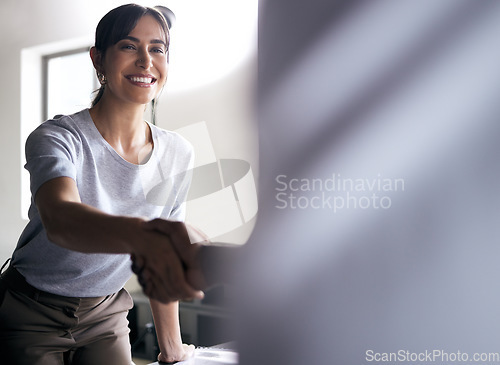 Image of Business woman, handshake and meeting for hiring, partnership or b2b deal and agreement at office. Hand of employees shaking hands for teamwork, collaboration or welcome in recruiting at workplace