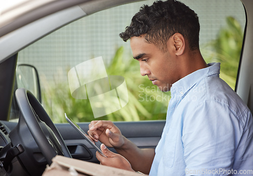 Image of Delivery man in car with tablet, boxes and checking location, order list or online map for logistics. Courier service, driver in van and internet connection for digital logistic schedule with package