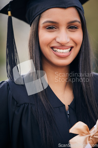 Image of Happy graduation and portrait of woman at college for future, scholarship and achievement. Certificate, university and success with female student for school, diploma and graduate celebration