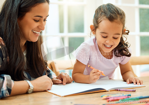 Image of Girl, mom and help on learning, homework and student writing or home school education, study and working on table. Mother, child and work together on math, drawing or parent helping on project