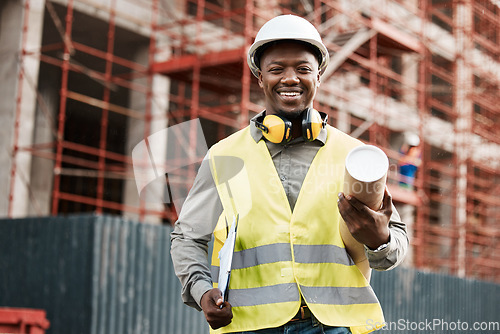 Image of Architect, black man and plan outdoor at construction site building with a smile for development. Happy African engineer person portrait for project management, inspection or architecture blueprint