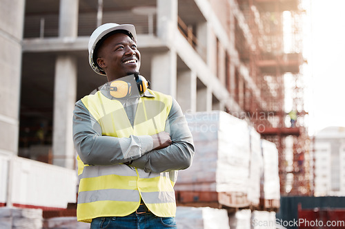 Image of Engineer, black man and thinking at construction site building with a smile for development or progress. Happy African contractor outdoor for project management, inspection and architecture idea