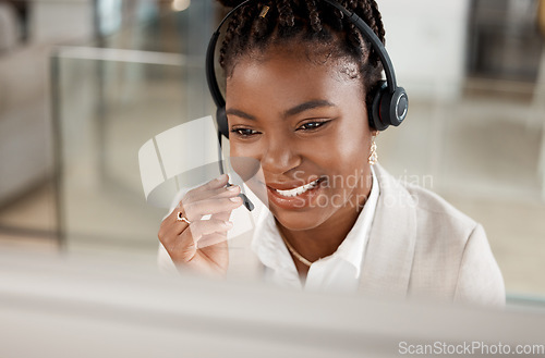 Image of Black woman, face and smile in call center for customer service, support or telemarketing at office. Happy African female person consultant agent smiling for online advice or telesales at workplace