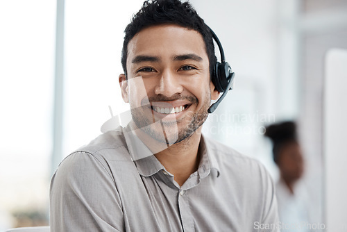 Image of Happy asian man, call center and portrait smile with headphones in customer service or telemarketing at office. Face of businessman consultant agent smiling in online advice or telesales at workplace