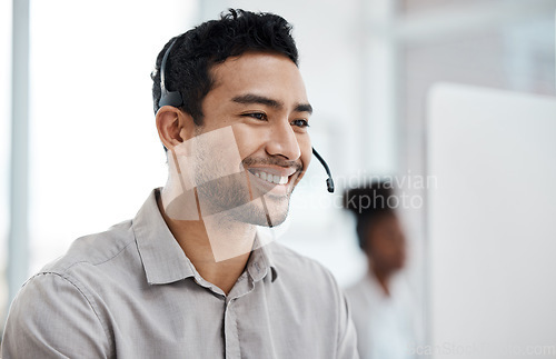 Image of Businessman, call center and smile with headphones in customer service, support or telemarketing at office. Happy asian man consultant agent smiling for online advice, telesales or help at workplace