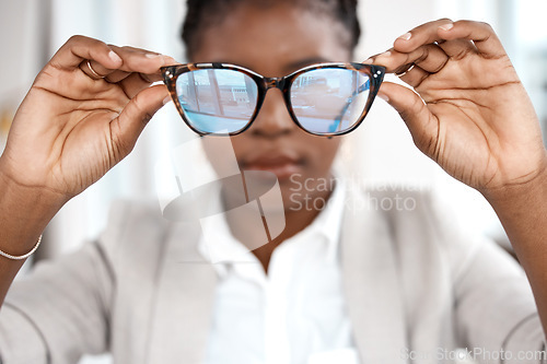 Image of Blue light, glasses and woman hands with frame at office with eye test and health. Professional, African female person and lens care with a employee with vision testing and eyewear to see at company