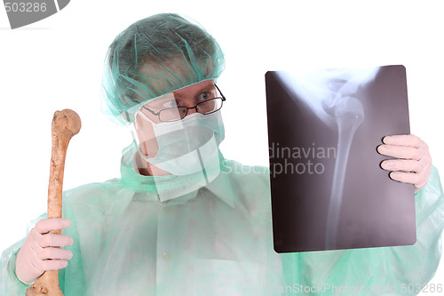 Image of surgeon with xray and bone