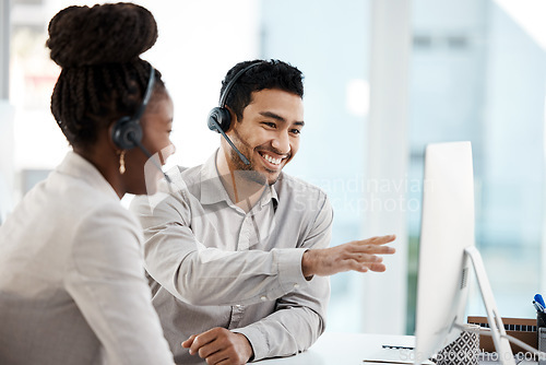 Image of Call center, training and computer with business people in office for coaching, customer service and communication. Help desk, contact us and mentor with man and black woman for sales and teamwork