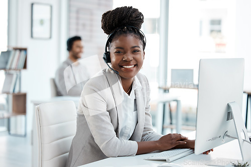 Image of Call center, happy and portrait of black woman in office for customer service, consulting or help desk. Smile, advice and sales with female employee for technical support, communication or ecommerce