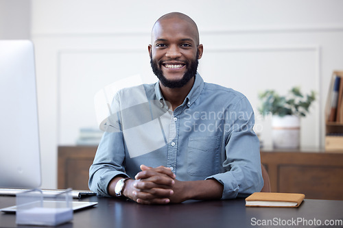 Image of Happy, desk and portrait of black man entrepreneur in corporate company or agency office arms crossed. Professional, African and young person or employee ready for business development with a smile