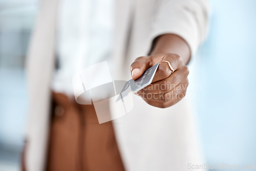 Image of Woman, hands and credit card in payment, ecommerce or financial banking at office. Hand of business female person giving debit in purchase, online shopping or wireless transaction to pay at workplace