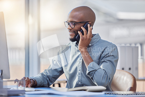 Image of Phone call, computer and business man for online advice, technical support and IT solution in office typing. Happy african person or information technology worker on desktop, talking and mobile voip