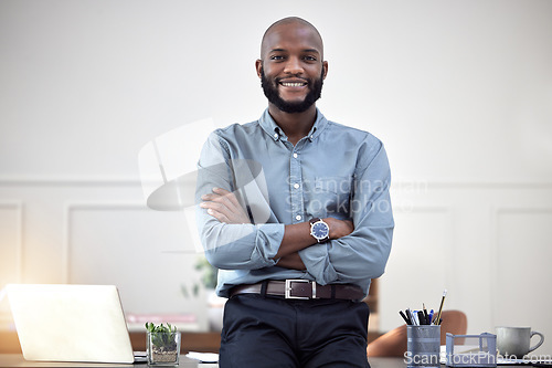 Image of Smile, startup and portrait of black man entrepreneur in corporate company or agency office arms crossed. Professional, African and happy young person or employee ready for business development